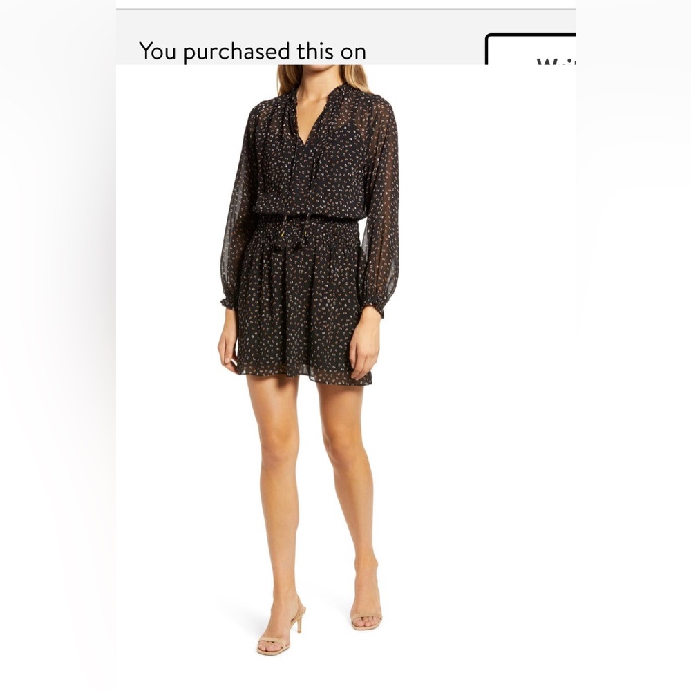 Socialite Dress Size Small. Black, long-sleeve dress.